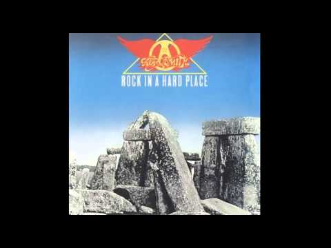 Текст песни  - Rock In A Hard Place