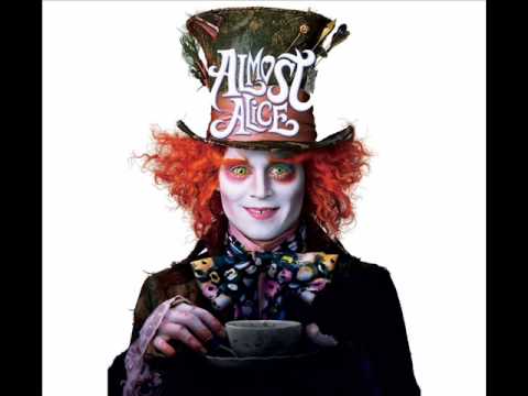 Текст песни  - Strange(OST Alice in the Wonderland)