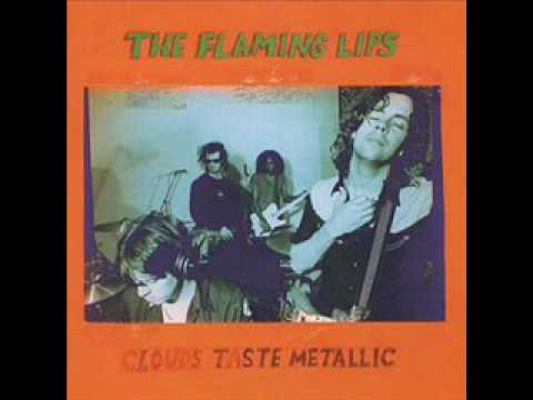 Текст песни The Flaming Lips - Lightning Strikes The Postman