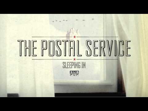 Текст песни The Postal Service - Sleeping In