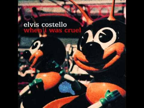 Текст песни Elvis Costello - Tear Off Your Own Head (It