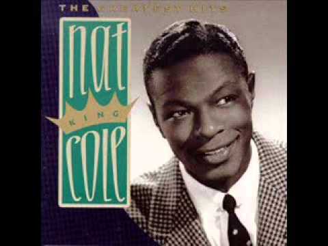 Текст песни Nat King Cole - Something Makes Me Want To Dance With You