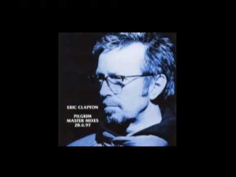 Текст песни Eric Clapton - NEEDS HIS WOMAN