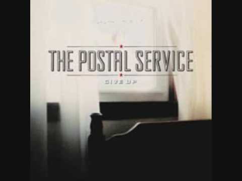 Текст песни The Postal Service - Brand New Colony