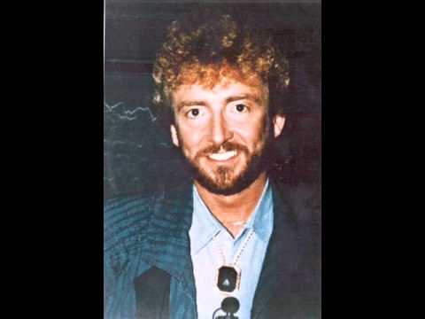 Текст песни Keith Whitley - Lucky Dog